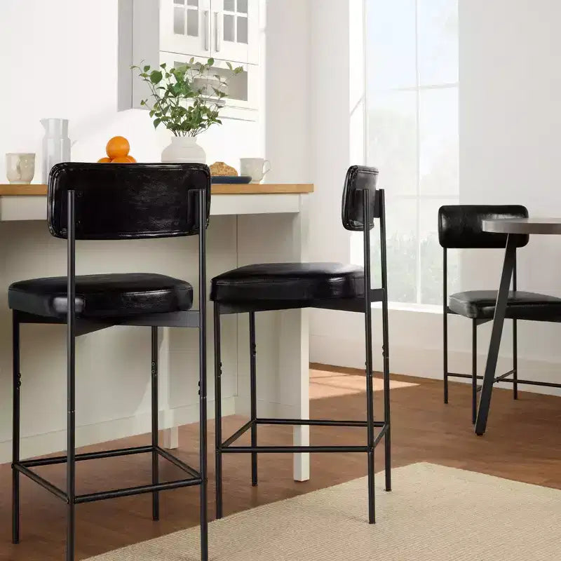 Lot de deux tabourets de bar en similicuir