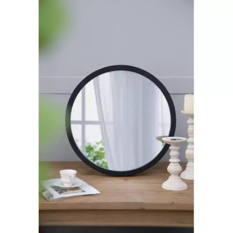 Miroir mural rond avec cadre en bois et finition noire