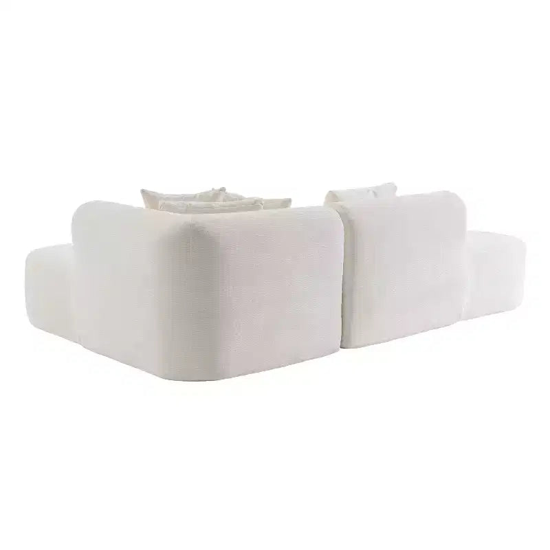 Canapé d'angle incurvé rembourré au design moderne