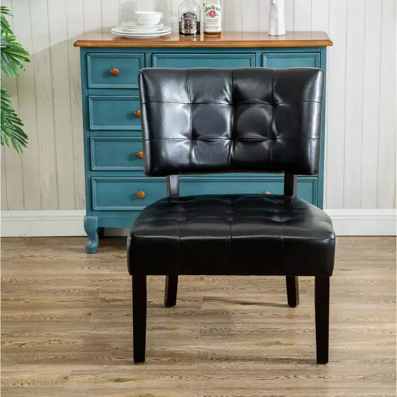 Fauteuil matelassé en similicuir style décontracté moderne