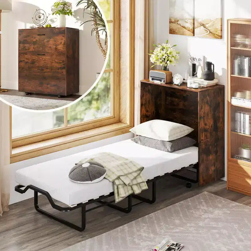 Lit bébé avec meuble de rangement roulant et lit pliant